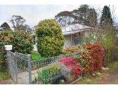  9 Whinmoor St Katoomba NSW 2780 Situated
 on an old established verdant garden with spectacular shows of colour 
throughout the year and a total area of approx. 670m2. Hidden behind a 
beautiful Sasanqua Camilla hedge, is this three bedroom 1960’s fibro and
 iron home in original condition and comprising of covered front patio, 
lounge room, dining area, small kitchen, bathroom and… - See more at: 
http://www.theopoulos.com/listings/?type=residential&subtype=residential#sthash.4KPXSEUy.dpuf Situated on an old established verdant garden with spectacular shows of colour throughout the year and a total area of approx. 670m2. Hidden behind a beautiful Sasanqua Camilla hedge, is this three bedroom 1960’s fibro and iron home in original condition and comprising of covered front patio, lounge room, dining area, small kitchen, bathroom and… 