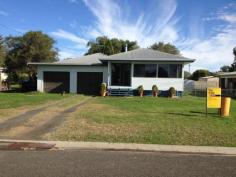  8 Railway Parade Injune QLD 4454 $270,000 Neg. Lowset 3 bedroom home in a thriving small town.Open Plan living area opening onto front verandah. Lounge has reverse cycle air-conditioning, fan & wood heater. Kitchen has electric stove, dishwasher & rangewood. Main bedroom is carpeted, built-ins and ceiling fan. Main bathroom has shower, toilet and another separate toilet. Laundry with linen cupboards. Access to 2 car garage from house! Side verandah with ramp. Huge outdoor area at rear of house with established gardens and palm trees. House is connected to 2 x 13600 Rain Water tanks as well as town water. 8x8 metre steel shed with cemented floors at rear of house with single three phase power. Tenure Type: Leasehold $800 yearly.   Read more at http://roma.ljhooker.com.au/C8HG2#21cyxwuFbI1Flcbi.99 
