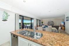  One of only a couple of 
beachfront reserve apartment options available in Caves Beach, this 
property distinguishes itself from the others in a big way. Offering
 features far superior to its neighbours, in terms of bigger apartment 
size, bigger garaging options and genuine ocean views with direct beach 
access not available in the bigger apartment options set back from the 
beach. Set in a more intimate group of only 5 apartments, this 
property boasts the only internally accessed 2 car remote entry garage. 
The current owners have their boat, car and plenty of shelving and 
stored items comfortably arranged inside. The apartment itself 
features generous, softly down-lit open plan living that flows off the 
entry and out to an extremely large, covered outdoor living area. The
 minute you walk inside you are taken aback by the unexpected 
spaciousness of the living and also the delightful outlook to beachfront
 shrubbery and ocean views. Spot the whales or count the ships and enjoy spectacular sunrises and amazing Nor Easterly breezes all summer long. The
 living flows off the top end, quality, 2 pack and granite designer 
kitchen, which is complete with not only an outlook to the living areas,
 both inside and out but also the ocean view. The internal living
 offers large dining and large lounge options with 2 sets of big stacker
 doors connecting the living to the oversized, outdoor living and the 
ocean view. A genuine, separate laundry also opens out to the deck and is complete with a very handy second toilet. The
 deck boasts room for both outdoor lounge and dining options with a tap,
 power and lighting all provided for extended easy all seasons 
indoor/outdoor living. Back inside discover 2 king size bedrooms 
both complete with generous built in wardrobes and easy access to the 
oversized bathroom with a feature large heat pump spa and separate 
shower. 