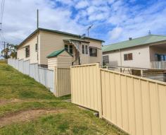  20 Vides St Cardiff NSW 2285 Corner Block with Side Street Access to Back Yard - MOVE IN OR INVEST!!!
 
 This well presented cottage is ideally set on a corner block 
offering side street access to the rear yard. Located in a quiet street 
within walking distance to the local primary school and just a minutes’ 
drive to the main street of Cardiff and train station. Featuring 2 
sizable bedrooms, a bright open family room, separate dining area and 
updated kitchen and bathroom. The home boasts many original and unique 
federation features including polished floorboards, picture rails, 
ornate fretwork and elaborate architraves. The level and fenced 
back yard accommodates a gated carport, secure under house storage and 
2nd toilet. A great place to start or rent out! Level fenced back yard Centrally located to schools, train station and amenities Rental return obtained was $365 p/wk 
 