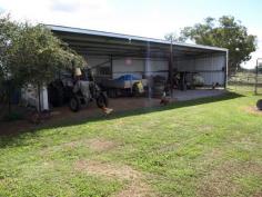  130 Doring Lane, MANILLA NSW 2346 The property is Approx 10 Acres (4.047 Hectares) Freehold and approx. 2 Acres Leasehold. Approx $900/year Extremely well located only 4.3 km to Manilla Post Office and approx. 45kms to Tamworth CBD. Council Garage collection, school bus and mail box (mail 3 times a week) at the corner of Dorling Lane (1.3km). The
 property is mainly level, it is well fenced into 4 main paddocks with 
the back paddock being the creek paddock, it is undulating country. Excellent
 water supply for a small acreage block. The bore pumps 3600litres/hr 
and supplies troughs as well as a storage tank for the toilets and house
 garden taps. There is double frontage to the Greenhatch Creek plus 
20,000 gal rainwater storage tanks. Comfortable
 3 bedroom home plus office featuring 2 living areas, wood fire, en 
suite to main and a spacious deck over looking the paddocks and creek. 4
 bay machinery shed, lockable 3 bay workshop with concrete floor & 
power connected, round yard and numerous garden sheds. And don't forget 
the chook yard! 