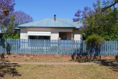  33 Wentworth Street Gunnedah NSW 2380 This home is located in an ideal location being walking distance to the CBD schools and sporting grounds. The home offers 3 good sized bedrooms, electric kitchen, wood fire and a good sized living room. Large back yard with loads of potential. 