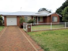  59 Wallace Street
Newtown
Qld
4350 This brick home offers 3 built in bedrooms, full bath & shower, single lock up garage, modern kitchen/dining.Fully fenced yard, paved pergola area and garden shed. Presently tenanted. Close to schools & bus stop. 