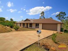  104 Anne Collins Crescent Mundoolun Qld 4285 $440,000  HIGH COUNTRY BARGAIN ON 1.2 ACRE'S 4 Bedrooms + Ensuite Looking for the ultimate bargain in the best area?  Then look no further. This, large, hilltop 4 bedroom home is ready and waiting. • 	 Quality Construction • 	 4 Large Bedrooms • 	 2 Big living areas • 	 Dining • 	 Modern Kitchen • 	 Air-con • 	 Big alfresco area  • 	 2 Bathrooms • 	 Double garage • 	 Stainless appliances  • 	 Fully Screened (‘Crimsafe’ doors) • 	 Huge workshop or storage area in garage • 	 Just under 1.25 acres (4957sq.m) • 	 Corner block • 	 Immaculately presented  Perched high on a hill with views and breezes in abundance. CLICK ON ANY PICTURE TO ENLARGE  The Mundoolun Estate has Over 300 Acres purely dedicated to Wildlife Corridors and Parklands, and is well known for its quality of housing. Each Acreage Property has Town Water, Underground Power & Phone, and Tree lined Kerb & Channelled roads.  Just a short drive to the thriving Jimboomba town centre; there you’ll find a fine array of Shops & Café’s including Woolworth’s, Coles, Bakers Delight, Mitre 10, the Post Office, Takeaways and much much more. Only 45 minutes to both Brisbane and the Coast. For an inspection please call (07) 5546 9093 PROPERTY INFORMATION Area: 4957 Square Meters Bedrooms: 4 Bathrooms: 2 Garage Spaces: 2 