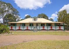  86 Castles Rd South Craignish Qld 4655 * verandahs all round * 1 kva solar power * 2 x tandem carports off house * 9x6m colorbond garage in back yard * 2 acres with town water * a/c living areas * new guinea rosewood kitchen, with gas cooktop and gas wall oven * 3 bedrooms down stairs and 1 bedroom and office upstairs * living areas and beds 1 & 2 open onto verandahs * property overlooks golf course * rates 1700 P/A water $500 P/A Nestled on 2 very private acres overlooking the golf course this renovated queenslander style home represents real Queensland living, boasting sprawling verandahs that wrap around the entire home to ensure you can always capture a breeze whilst sitting back and enjoying nature or the golf. This well cared for home offers 4 large bedrooms, 3 downstairs and 1 upstairs, upstairs there is also an office or utility room. Of the 3 downstairs rooms, 2 offer access onto the verandahs whilst the main also has an ensuite. The kitchen is finished in stunning New Guinea rosewood and is a delight to work in, the cook top and wall oven are gas ensuring you can cook if the power goes out and of course there is storage galore. The air conditioned dining room overlooks the kitchen and leads out to the verandah. The large family/lounge area is also air conditined and offers enough room for the largest of family gatherings. For the vehicles there is a tandem carport on either side of the house as well as a 9x6 m color bond shed. The block is fenced on 3 sides and would be the ideal setting for a couple of family farm pets. Phone Realway Property Consultants today on 0741284255 to arrange your personal inspection.   