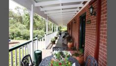  61A Greenup Street, Stanthorpe, QLD 4380 $449,000 * Set in a quiet street not far from the CBD * Elevated brick three bedroom plus office & two way ensuite, extra bathroom with shower & toilet * Enjoy the warmth & the views from the front verandah or the shaded entertaining area at the back * Exposed beams in lounge, polished floors, insulation, rainwater * Beautiful easy care gardens set on a 1536 sqm block * Spiral staircase to double garage & storage * www.raywhiteruralwarwick.com.au Property ID:1106044 