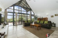  54 The Fairways Gnangara WA 6077 2.5 ACRES PLUS STUNNING HOME! BUSH LIVING IN THE METRO AREA! Bring the pony and the golf clubs! This beautiful property is low maintenance and set amongst gorgeous native bush, birds and trees, in the sought after "High side area of Gnangara" Stunning home with big glass doors, High atrium windows, wrap around timber decking, patios and entertaining areas with lovely elevated bush views. Especially designed for cooling & heating enjoying a big central feature fireplace, Feature fans to all rooms, and big central split air-conditioning. Huge open plan living with separate left wing for the Master bedroom and study and separate right wing for the minor bedrooms, bathroom & laundry. Privacy ensured! All rooms enjoy the stunning views! Huge king master bedroom with big glass doors to the decking enjoying awesome views. Spacious walk in robe and stunning big en-suite bathroom with deep luxury bath, big glass shower, feature vanity and quality fixtures Huge study/ or 5th bedroom. 2nd & 3rd Queen sized bedrooms both with double built in robes Double doors to 4th . General Features Property Type: House Bedrooms: 4 Bathrooms: 2 Building Size: 216.00 m² (23 squares) approx Land Size: 1.01ha (2.50 acres) (approx) Indoor Features Ensuite: 1 Open Fireplace Outdoor Features Garage Spaces: 4 Other Features RCDs, Deck, Verandah, Terrace/paved, Outdoor entertainment area, Undercover outdoor area $1,149,000 