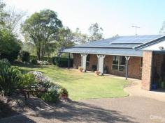  81-83 Scarvell Place Kooralbyn Qld 4285 $415,000 This immaculate brick 4 Bedroom 2 bathroom home on 4876m2 acreage land is pure joy to list.
 Situated in a rural setting with lifestyle facilities, this is a home that needs to be inspected to appreciate.
 The large kitchen with enormous amount of cupboard space, has open 
plan access to the living, media room, and formal lounge area. This has 
been beautifully decorated, made spacious, airy, and invites the outside
 in with large windows and glass doors. The covered and screened 
Patio the length of the home opens from these rooms, is the ideal area 
for entertaining, and where most Queenslander's live year round. The 
present owners watch the wildlife daily from here.
 The bedrooms are large, all with built ins, and the 
presentation of these rooms is a delight. The main bedroom has an 
ensuite and opens to the patio for morning coffee. The main bathroom has
 separate toilet.
 The above ground pool is fully fenced and easily accessible to the patio area.
 It is the paved barbecue area under the large jacaranda tree just 
off the Patio, which gives thoughts of evening drinks, with friends and 
family.
 There is a double lock up garage with access into the home.
 Additionally a "Man's Shed" 7 x 5.5 m with extension workshop.
 All the gardens have been landscaped and the driveways are 
immaculate, with separate entrance to the Man shed. There is also access
 here for a motor home or caravan.
 The back area of this acreage property, has been fenced to run a children's pony or horse with plenty of accessibility.
 This is a must see property
 Local Agent has exclusive listing and lives 2 mins away, so viewing is at any time.
 Rosemary Lawson-Quinn
 Servicing the Kooralbyn Area. 