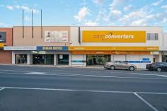  119-131 Murray St Gawler SA 5118 With two titles and total land area of 
1630m2 this two level building has a GLA of 935m2. A current nett income
 with strong leases in excess of $165,000 pa has further potential with 
two further available tenancies. Positioned in the heart of 
Gawlers main street the property has rear access and on-site carparking.
 Must be sold! Further details Danny Dare 0411 814 131 

 