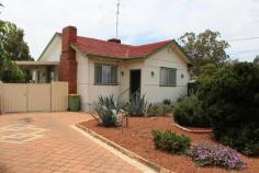  5 Edmondson St Northam WA 6401 Neat Inexpensive Home - Just right !! What a perfect way to enter the Northam residential property market - a delightful three bedroom home with great street appeal, neat indoors, excellent patio and room for the kids to play. The property is well fenced, and gardens are very low maintenance. Enter the lounge, and you have a pleasant room with open fire place, plus split system air conditioning. You have three bedrooms, a modernised bathroom, and the kitchen/dining is a pleasure to the eye. At the rear is a brick paved patio - perfect for the forthcoming spring and summer months. There are a couple of garden sheds, rain water tank and a carport. Put it all together and you have a very comfortable home for your family. 