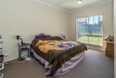  5 Rosefinch St Upper Coomera QLD 4209 ***To arrange to take a closer look contact Colleen Sutherland on 07 5535 8854 or 0438 620 511***  This well presented, 4 bedroom home is positioned in an easily accessible pocket of Upper Coomera. It is in a perfect location for the busy family. This home is in a well established “young” estate of Upper Coomera. High ceilings enhance the spacious look of the home. The comfortable, open-planned living is a spacious area and balances with the high ceilings & clean neutral coloured walls. It all contributes to the character of this home with its relaxed feel and is easy to maintain. The tiled floor allows a good flow from the dining room overflowing onto the covered entertainment area. For the young family there is plenty of bedroom space for study, sleep and play. Outdoor living on a level block is ideal to put your feet up and chill out. The outlook from the back yard is private and gives the heightened sense of privacy to this home. This simple and functional home is rock solid with hardwood timber and block brick work. 