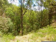LOT 11 McLean Rd S Camp Mountain QLD 4520 CAMP MOUNTAIN - Just minutes from Ferny Grove you will find this peaceful 2.13 Hectare block sitting amongst bushland surround by State forest. This land takes advantage of the views out over Camp Mountain towards Samford valley and beyond. The block is very private and would suit anyone looking for a quite bush setting with not a neighbour in sight. Just minutes drive to train and major shopping centre