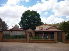  12 Crouch St Neville NSW 2799 $390,000 Property type: House Suburb: Neville (profile) Region: Regional NSW Land area: 5099 sqm  LARGE FAMILY HOME WITH MANY EXTRAS Spacious accommodation for larger family or subdivided for peaceful lifestyle / investment. Offering a two story brick veneer residence with 4 bedrooms - 2 with ensuite, and 2 additional bathrooms all set on 5099sqm with attractive low maintenance garden at the front of the house and semi landscaped at rear. Add a modern spacious immaculate kitchen with Caesar stone bench tops, 2 drawer dishwasher with ample storage, separate dining room, lounge and bar, 3 interior entertainment areas – 1 with sunken hot tub, 2 offices/studies and 3 bay carport. A laundry with commercial washer and dryer completes this unique property. There are 3 AC units throughout with gas heating in family area and in-floor heating in the bathroom, kitchen and spa areas. There is a large workshop with 6 additional high sheds with a concrete floor suitable for a variety of hobbies and an outside room perfect for grandma / teenager / music / craft. The list is endless for this property & we highly recommend an inspection today! Features Air conditioning Alarm System Bath Dishwasher Ensuite Fireplace(s) Garden / Courtyard Gas Heating Indoor Spa Internal Laundry Pets allowed Secure Parking Separate Dining Room Shed Study 2010976115 