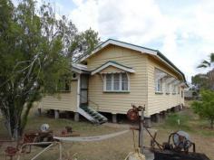  12 Best Street, Warra, QLD, 4411 HOUSE + HUGE SHED ON 2,024m2 The Vendor has moved on and needs this 2 bedroom timber home sold. Situated on a large 2,024m2 block in the township of Warra the property has town water connected, 3 x rain water tanks, power and mobile phone service.  Warra is a small township 30 mins from both Dalby and Chinchilla and has a primary school, school bus to Dalby high schools, post office and hotel. The shed has to be seen to be believed - 14mx9m with 3 large roller doors + 9m x 9m attached car accommodation with extra toilet. Power is connected and the floor is concreted.  Features of the home include: * Open eat in kitchen and lounge room with ceiling fan * 2 x bedrooms + sleep out. The main has built in cupboards and a ceiling fan * Bathroom and separate toilet * Downstairs laundry and extra storage room For further information contact the agent Warren Barker 0429 893 099. 