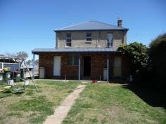  107 Lambeth Street, Glen Innes NSW 2370 * Solid double brick building divided into 3 units * Large roomy 2 bedroom unit upstairs currently rented for $130 per week * Two x 1 bedroom units downstairs currently rented for $100 & $110 per week * The units feature polished timber floors & modern updated kitchens & bathrooms * The upstairs unit has a lovely wide verandah * All units share the large backyard, laundry & car accommodation $210,000 