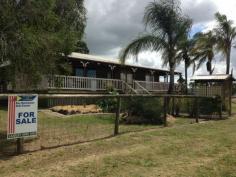  49 Keanes Road Rosewood QLD 4340 Timber Home on 10 Acres Bring Your Horses!  Set on a 10 acre block just outside of Rosewood features this well presented - 3 Bedroom Timber Home. Ideal for the family with horses, this home boasts : - Three bedrooms + study  - Large open plan living area with wood heater - Bedrooms with Built ins & Carpet - 2 Way Bathroom with Separate Bath & Shower  - Full length decks - front & back  - Large 4 Bay Machinery / Hay Shed  - Horse Stable  - Wooden Cattle Yards  - Water: Dam, Bore & Tank Water - Only a short drive into town & schools All this on a Fully Fenced 10 Acre Block.  Currently Tenanted for $450 p/w. Call to Book an Appointment Today Property Code: 1381 General Features Property Type: Acreage/Semi-Rural Bedrooms: 3 Bathrooms: 1 Land Size: 4.04ha (9.98 acres) (approx) Price per acre: $40,080 Outdoor Features Carport Spaces: 2 Garage Spaces: 1 Other Features Deck, Verandah, Outdoor entertainment area, Undercover outdoor area, Fenced, Low maintenance $400,000 