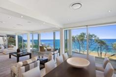  14 S Scenic Rd Forresters Beach NSW 2260 Per night: $650 to $1,300 Per week: $4,000 to $8,500 Maximum adults sleeps 8 Total adults & children sleeps 8 Bond required | Linen included 
 
 This architect designed tri-level beachfront is absolutely 
spectacular. From the moment you enter its front door you will fall in 
love with Sea Dream. The ultimate entertainer's delight Sea Dream is the
 perfect retreat for family groups. Featuring floor-to-ceiling windows, 
seamless indoor/outdoor living, multiple sitting areas and living spaces
 including kid's room, and two full kitchens, this holiday home offers 
the perfect retreat for family groups. Be amazed by the panoramic views 
that await you and enjoy super spacious interiors, ultra modern 
finishes, high ceilings and travertine tiling throughout. Take in fresh 
ocean breeze and wonderful outlook from all levels of this amazing 
house. Master bedroom contains a king bed, balcony with panoramic views,
 walk-in robe and en suite with corner spa, shower and views. Bedroom 2 
contains a king bed with built-ins and balcony. Bedroom 3 contains a 
queen bed and built-ins. Bedroom 4 contains two single beds and 
built-ins. 
 Living spaces with plasma TV, DVD player; surround sound; multiple sitting areas Ultra modern kitchens with electric cook top, oven, dishwasher, fridge, microwave Entertaining deck and balconies on all levels baring magnificent views; BBQ Direct beach access; sprawling lawns for kids to play; landscaped courtyard Secure entry; alarm; C-Bus system; intercom; sea breezes; remote double garage Main bathroom with shower, bath tub; two bathrooms contains shower, toilet 