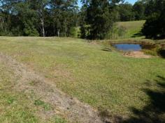 This nicely elevated 6,443 sq.mtr. block has plenty to offer. There is a
 great building site overlooking the land and it is nicely set back from
 the road. There is also a dam for extra water and the block is in a 
rural setting but less than 10 minutes from the main Bruce Highway. 
Another feature is that the building site overlooks a lovely rural 
setting.					