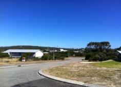  2 Buck St Bremer Bay WA 6338 This corner block is lightly scrubbed at a high position overlooking the town and the estuary. It is 955 Sqm connected to mains power, water and sewer. 