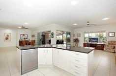  19 to 21 Hirst Court Ningi QLD 4511 GREAT HOUSE – EXCELLENT LOCATION Just 4 years old, this ‘as new’ house sits perfectly in a quiet cul-de-sac on a tropically landscaped 3,003 m2 block.  The house is 291.61 sqm with another 56.5 sqm under roof screened entertainment area, giving a total living area of 348.11 sqm. With colourbond roof and light coloured brickwork, the house is ideally suited to the Queensland climate. The house is modern open-plan living featuring 9 foot ceilings throughout.  More than luxurious and comfortable, this home also ticks all the boxes for energy efficiency: • All walls are fully insulated with RI.5 batts and the roof area with R3.0 batts.  • 24 month old 1.52KW solar power system, with a fully transferable warranty.  • Hot water is generated via the very energy efficient heat pump system • Tinted windows to reduce heat and glare • Energy efficient lighting and ceiling fans Other features include: • Fully screened outdoor entertainment area, which is cooled by a centrally located ceiling fan • Four large carpeted bedrooms • Master bedroom features an enormous walk in wardrobe / dressing room and ensuite with large shower and double vanity. General Features Property Type: House Bedrooms: 4 Bathrooms: 2 Land Size: 3003 m² (approx) Price per m²: $213 Indoor Features Built-in Wardrobes Dishwasher Split-system Air Conditioning Outdoor Features Remote Garage Carport Spaces: 4 Garage Spaces: 4 Outdoor Entertaining Area Shed Eco Friendly Features Solar Panels Water Tank $639,000 