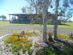  141 Oakview Drive Childers Redridge QLD 4660 Dual Living, Big Family Home on 5 acres...Stop Looking & Inspect! Located 10 mins from Childers, 20 mins to Woodgate Beach and 25 mins to Bundaberg. Built June 2010 this home has stunning features and offers a new owner comfortable dual living and solar to grid as a bonus! House: 4 bedroom Fans and B/I's  Massive gourmet kitchen - Island Bench, Dishwasher, SS Gas Stove, Glass R'hood & Glass Splash Back Beautiful Polished Cypress Pine Flooring throughout the house Huge Lounge Dining Room overlooking the front gates and views Stunning bathroom w/ claw foot bath, shower and country vanity Heaps of storage built ins 3 x 5,000gal tanks Huge Veranda's on 3 sides w/ cypress pine boards Fully Security Screens Vacuum Maid cleaning system throughout house 2.7m high ceilings Liveable Shed: 7m x 8m living quarters, 4.2m x 7m Carport & 3m x 7m patio area 1 bedroom Studio w/ A/C Toilet and Shower Kitchen and dining Lounge Room TV Antenna The block is service with water by a good dam, fire fighter pump and a 2' ring water line with multiple points throughout the yard. Established fruit trees in place and bearing 3.6KW Solar to Grid system 20foot shipping . General Features Property Type: House Bedrooms: 5 Bathrooms: 2 Land Size: 2.04ha (5.04 acres) (approx) Indoor Features Ducted Vacuum System Air Conditioning Outdoor Features Carport Spaces: 1 Garage Spaces: 1 Other Features Balcony, RCDs, Deck, Verandah, Outdoor entertainment area, Dam, Fenced, Granny flat $485,000 