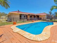  162 Kirralee Cres Upper Kedron QLD 4055 MAKE A SPLASH WITH FAMILY THIS XMAS Inspection Times: Sat 06/12/2014 12:00 PM to 12:30 PM An outstanding opportunity to secure an immaculate single level, entertaining residence within a peaceful, family friendly locale. On offer is a versatile, free flowing floor plan that sees a seamless connection between indoor living and outdoor entertaining areas catering for the largest of families.  Four generous size bedrooms service the family home with an additional study offering a private space for buyers to work or study from home. Three of the four bedrooms feature built in robes while the master suite enjoys an ensuite bathroom and walk in robe. Ducted and zoned air-conditioning throughout provide year round comfort for the entire family.  The heart of the home centres around a well-equipped kitchen that services the adjoining dining space and large rumpus while the intelligent layout cascades out through sliding glass doors to the covered outdoor entertaining area which overlooks the magnificent swimming pool.  Centrally located within close proximity to public transport facilities, the new owners will enjoy the easy commute to the CBD via the nearby Ferny Grove Train Line or road access to Samford Road. A variety of schools and day care facilities as well as parks, dog parks, cafes and a variety of shops are all positioned within minutes of the doorstep.  Awaiting the perfect buyer; couples and young families looking for property with size are invited to add their personal touch to the property with ample potential to create a grand family residence so inspect today!  