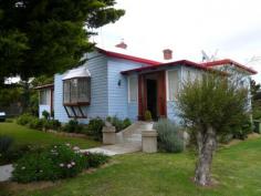  77 Bulwer Street   Tenterfield   NSW   2372 Why Wait - Start Here! This renovated three bedroom weatherboard home in elevated position overlooking Mt McKenzie, features polished boards throughout the kitchen, living and sunroom areas. The kitchen boasts a large pantry, lounge has slow combustion heater, the two larger bedrooms have open fireplaces, while the smaller bedroom/sleepout is light and airy. A lovely north facing sunroom capitalizes on the winter sun. The 1673.14m block is fully fenced and has bitumen drive to garage. $265,000.00 