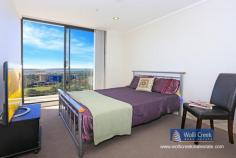  A1803/35 Arncliffe St Wolli Creek NSW 2205 $865,000 A rare opportunity to purchase this modern 2 bedroom apartment on level 18 in Proximity building, spacious floor plan with 180 degree panoramic views of the airport, cooks river and botany bay. Features include 2 bedroom, ensuite, built-ins, open plan kitchen with caesar stone bench tops, gas cooking, dishwasher and stainless steel appliances plus 1 security car space. Complex offers lap pool, sauna and gym. Short walk to new Woolworths super market and train station. Strata approx $1700p/q, council approx $268 p/q and water approx $168p/q. Property: 	 Apartment Bedrooms: 	 2 Bathrooms: 	 2 Parking: 	 1 Council: 	 Rockdale 