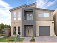  17 Macmillan Ave Mawson Lakes SA 5095 $565,000 - $585,000 A Light Filled, Spacious And Quality Built Family Property! Imagine having a picturesque lake and a park complete with children's play equipment at your back door...Well imagine no more! This quality 2010 built home is situated in the Shoalhaven Estate of Mawson Lakes and has many features for the established or budding family. As you enter the home you will be greeted with stylish solid timber flooring and neutral modern tones awaiting your personal taste and furniture. Highlight features include a vast master bedroom complete with ensuite and walk in robe. Bedrooms two, three and four are sizable and offer you built in robes. The properties second bathroom is spacious and offers you a spa and separate water closet. Upstairs also features a versatile parents/teenager retreat. Cook in style within your own sizable kitchen featuring a centre island/breakfast bar, dishwasher, walk in pantry and ample cupboard space. Adjacent to the kitchen is the dining area; however the floor plan allows for flexibility to meet your living requirements. The large open plan living and family room is ideal for a large gathering and outlooks the well-manicured park. Once outside you are greeted with the alfresco entertaining area complete with decking and a low maintenance lawn.  Other notable features include a downstairs study and water closet, reverse cycle air conditioning with zone control, alarm, video intercom and garage with automatic roller door. Please Contact Agent For More Details. RLA 235 270   Property Snapshot  Property Type: House 