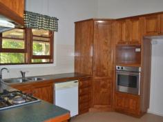  22 Meson Street Gayndah Qld 4625 $275,000 Beautifully Restored Queenslander - Entertainers Delight * 4 good sized bedrooms - 2 with walk in dressing rooms * Returning $285 p/w on a long term lease * Beautiful timber kitchen with ample bench space, dishwasher, gas cooktop + servery * Huge entertaining deck overlooking the back yard * Bathroom features shower over bath & linen cupboard * Polished wooden floors in lounge & front entry room * 3 reverse cycle A/C + ceiling fans * Large 1,363m2 allotment - plenty of room to watch the kids play from the back deck * Centrally located - stone throw away from schools and shops   Property Snapshot  Property Type: House Land Area: 1,363 m2 
