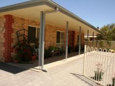  1/11 Second Street Ardrossan SA 5571 $344,500 Retirement Living in Comfort & Security Comfortable & Modern Courtyard home located within 300 metres to Main Street & Bowling Green. A secure homette offering Rooms of Generous Proportions including Ensuite & walk in robe. Generous sized open plan kitchen with pantry & ample cupboard / bench space overlooking open plan living / dining. Roller door garage, easy care rear yard. Located in a small group of three quality residences Enjoy a quality lifestyle in a very fine location without the worries of maintaining a garden.   Property Snapshot  Property Type: Unit Construction: Brick Veneer Features: Built-In-Robes Close to schools Close to Transport Courtyard Dining Room Ducted Heating Ensuite Remote Control Garaging Security Screens Verandah Walk-In-Robes 