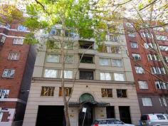 1/18 Macleay Street Potts Point NSW 2011 ID #: 0000247044 Auction: Auction Thursday, 19 Mar 05:30 PM Type: Apartment Bed: 2    Bath: 2    Car: 1  'Villard' - New York Style Living In the Fashionable Heart of... Offering quiet privacy and a spacious layout for classic contemporary luxury living, this elegant pied-a-terre occupies a rear wing position in 'Villard', one of this cool cosmopolitan locale's most prestigious modern security buildings. Designed by the acclaimed architect Ercole Palazzetti and inspired by the grandeur of New York or Paris, you'll be impressed by this tightly-held boutique building and the ultra-convenient location. With the buzz and lifestyle of cafes, restaurants, shops, transport and parks just metres from the door, this impeccable apartment is perfect for those scaling down or trading up. * Level entry, security lift access via grand lobby or from security parking * Central foyer, 2 spacious bedrooms, both with built-in wardrobes * 2 marble bathrooms, master ensuite with bath and separate shower * Open plan living/dining areas lead out to private entertaining balcony * Granite Smeg gas kitchen, breakfast bar, st/steel appliances, ample storage * Spacious layout with leafy outlook, designer finishes, internal laundry room  * European Oak parquetry floors, quality carpet in bedrooms, elegant joinery  * Easy access to residents' heated pool set amidst sunny rear garden terraces * Superbly maintained modern security building amidst landscaped surrounds 