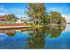  106A Main Rd Toukley NSW 2263 33 Day Sale if not sold prior to 17th Feb 2015 $510,000-$590,000  The Best of Both Worlds Has Arrived In what could be described as one of the most unique North-facing waterfronts on Tuggerah Lakes, this wonderful cottage will be the envy of all your friends. With a unique existing use right this property almost laps the water’s edge and perfect for all water sports activities. Set facing a Northerly direction, this two bedroom home is of generous size and has an outstanding view across the lake for those magical sunrises of a morning. With the potential to improve the current granny flat for friends or family or even a studio/ office/ music room, your life style will be the sea change that you always desired. Position has never been more applicable be sure to inspect today, call Darin Butcher. Absolute waterfront Outstanding views Dream lifestyle 2 bedroom + granny flat 481 sqm block Prime position close to all major shops and public transport View: By appointment Value @ $590,000 Agency: Wiseberry Heritage Agent: Darin Butcher DISCLAIMER: This advertisement contains information provided by third parties. While all care is taken to ensure otherwise, Wiseberry Heritage, Wiseberry Charmhaven and Wiseberry Wyong does not make any representation as to the accuracy of any of the information contained in the advertisement, does not accept any responsibility or liability and recommends that any client make their own investigations and enquiries. All images are indicative of the property only.   Property Features: 1 Building2 Bedroom1 Bathroom1 Living Room120m2 Building SizeRendered ConstructionContemporary StyleGood Condition2 Parking481m2 Land Size1 BackyardR2 Zoning 