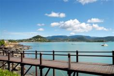  131/159 Shingley Drive Airlie Beach Qld 4802 $385,000 Located in the prestigious Marina Shores development with level entry this north facing luxury one bedroom apartment is positioned perfectly within the resort opening up onto a 100m2 plus level lawn area, huge pool and convenient walk way to Abel Point Marina and the main hub of Airlie Beach. This as new property features a stone and stainless steel kitchen with Miele appliances, air-conditioning, large bedroom with built in, covered car space and spacious living with full height floor to ceiling glass doors opening onto the covered alfresco dining area. The resort style complex is the perfect investment with easy holiday letting or ideal first property. Bring all offers! Please contact the Sales Consultant to view a copy of the Sustainability Declaration for this property. Floor Area 	 95 sqm Property condition 	 Excellent Property Type 	 Unit, Apartment House style 	 Contemporary Construction 	 Render Roof 	 Colour steel Flooring 	 Tiles and Carpet Heating / Cooling 	 Reverse cycle a/c, Ceiling fans Kitchen 	 Modern, Dishwasher, Rangehood and Breakfast bar Living area 	 Open plan Main bedroom 	 King, Built-in-robe and Ceiling fans Ensuite 	 Spa bath, Separate shower Laundry 	 Separate Views 	 Waterfront Outdoor living 	 Pool (Inground), Garden, Deck / patio Land contour 	 Flat Grounds 	 Landscaped / designer 