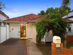  12 Westbourne St Highgate Hill QLD 4101 Anyone for Something a Little Different? - "1960's Brick & Tile" Located Just around the Corner from Brisbane State High School, West end's Boundary Street Cafe Scene and within Easy Reach to Public Transport Or South Bank is this Rarely Available Hi-set Brick & Tile Home. Situated in Such a Quiet almost No through Street this Large home Comprises of 5 Bedrooms & 2 Bathrooms Set Over 2 Floors, an Open Plan Living/Dining/Kitchen which Exits to the Large Deck which Captures a Cool Northern Aspect. On the Lower Level there is a Separate Family Room with Bathroom, Bedrooms Or If Required this Area Below could be Used for Storage Or as a Granny Flat. With so Much Potential to Expand Upon Or Remodel this Home Has Loads of Room to Work with, Can Easily Accommodate a Larger Family In Search of a Relaxed Inner City Lifestyle. While Set on a Leafy 460m2 Allotment with a Well Manicured, Low Maintenance Garden means there is Enough Room to Add a Pool Or Outdoor Gazebo. For Investors You Must Take Note of this Porperty's Location, Size and Condition which All Assures a Steady Rental Stream & Future Capital Growth.  Please Note: Be the First to Inspect this Sat. 7th Feb. 2015 at 2 -2.45pm by Calling to Register your Details.  Our Seller's are Committed Elsewhere, So their Instructions Are Clear - "We Want to Sell" For Further Details, Or to Arrange An Inspection, Please Call.   Property Snapshot  Property Type:RoomAspect Views:NorthernConstruction:Brick House Size:180.00 m2Land Area:460 m2Features:Balcony Built-In-Robes Close to schools Close to Transport Decking Dining Room Established Gardens Fenced Back Yard Fully Fenced Yard Lounge Polished Hardwood Floors Renovated Rumpus Room Storage Verandah 