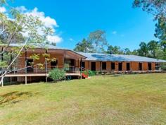 51 McInnes Rd Ironbark QLD 4306 Offers Over $880,000 Lamarque "Lamarque" in Keeah Forest. Offering privacy and seclusion, 30 mins to Brisbane CBD on 44 acres of gentle undulating countryside, with a mixture of horse country and timbered country. As you drive up the private winding driveway you then discover "Lamarque" the most amazing huge 5 bedroom country homestead with features that you don't normally have an opportunity to be able to procure, with its Helidon sandstone floors through to the living areas, separate lounge with fire place, dining room with it's own fireplace, master bedroom with walk-in-robe as well as en-suite, a separate office and a massive entertainment room with its beautiful polished grey Ironbark flooring, built-in media cabinet, wet bar made from South American Myrtle and lounge including pool table area that is as big as a ballroom. With it's high ceilings this house is amazing with the solid red cedar doors throughout, exterior doors and windows are French glass panel also in cedar with ornamental security screens crafted by artist blacksmith Steve Wilson, an amazing kitchen made from Antartic Beech originally felled on Fraser Island in 1899 to be used in the Lands Administration Building in George Street in 1902, then reclaimed during renovations in the 90's and used by designer Bernard Trafford in the home in 2001. It's special features include a 900mm Ilve gas stove with Teppanyaki plate as well as a concealed Asko dishwasher. Then there's the huge covered entertainment deck where you can sit and observe the natural wildlife, or entertain, giving you the lifestyle you deserve to have with your family. There are plenty of yards and a 4 bay Titan shed plus other rural infrastructures such as fencing, day paddocks and dams, chook shed and garden shed that makes this the perfect place to settle down with your family in a private setting, yet so close, 35 minutes to Brisbane CBD, 5 minutes to Brassall Shopping Centre, 10 mins to Ipswich CBD, 6 mins to train station, 5 mins to West Moreton Anglican College. Owners have moved south and want this unique property to belong to someone that will love and enjoy living here as much as they have 