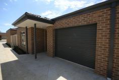  2/9 Form Street Wendouree Vic 3355  $269,950 Great Inner Wendouree Location Townhouse - Property ID: 777803 *Top spot close to strip shopping center *Over 10 sqs of living *Two bedrooms with BIR's *Having a 2.5 sqs garage with electric roller door *Gas central heating *Fully tiled and carpeted *Chain controlled window furnishings *Concrete driveway *Landscaped gardens and surrounds  