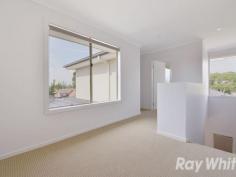  2/27 Wedge Crescent Rowville Vic 3178 $500,000 - $565,000 A Brand New 3 Bedroom, 2 Bathroom Rear Townhouse Brand new and designed with a busy modern lifestyle firmly in mind, this rear townhouse on a block of just 2 will pique the interest of both occupiers and investors. Its 2 storey faade makes a grand impression from the front and when you step inside you find an open living area with adjoining dining space and a stylish kitchen with stone benches and all stainless appliances. There are 3 robed bedrooms including the ground floor master with a walk in wardrobe and an ensuite while the 2 upstairs bedrooms share a retreat and bathroom. Additional features include an additional powder room, European style laundry, ducted heating, evaporative cooling, a double garage with remote door and internal access plus a landscaped courtyard with sunny northern aspect. Right near Waterford Valley Golf Club the home is also close to buses and Rowville Lakes Shopping Centre with Stud Park and schools just minutes away. 