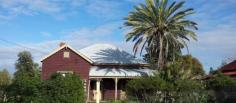  94 Derribong St Peak Hill NSW 2869 $85000 PSRE presents a “CHARACTER FILLED HOME” hoping someone special will buy it to call home.Located in a quiet street, within walking distance to churches, schools,shops.Filled with all the charm of “yesteryear.” Constructed of weatherboard inside & out, with an iron roof and bullnose verandah around 3 sides. There are 2 fireplaces,3 bedrooms,living room and,dining room area. An internal void area where the house was extended and is perfect for a play/hobby/sitting area. It is connected to town water and sewerage, has electric hot water system and stove. There is a shower in the bathroom and internal toilet located in the laundry. Two iron sheds in the large rear yard, with a gateway to rear laneway.All on a generous tree studded block. 