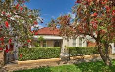  85 Clarendon Rd Stanmore NSW 2048 1,880,000 Standing on an enormous 442.6 square metre block in arguably one of Stanmore's finest neighbourhoods, this outstanding freestanding residence is perfect for those seeking a substantial and quality family home. This elegant home while fully renovated lends itself to a diversity of extension styles. Beautifully positioned less than 100 metres from Weekley Park, it is also just a brief stroll to Stanmore Station, esteemed local schools and a tempting selection of village shops, cafes and restaurants. The home's grandeur is immediately evident, with a gracious period facade and a stunning leadlight door which frames an unusually wide entrance hall. The home has four large bedrooms, the main with generous built-in wardrobes and a designer ensuite bathroom. It also offers a full bathroom with a separate WC, a stylish open plan living and dining room and a well-appointed modern kitchen with a Fisher & Paykel dishwasher, plus a Smeg oven and gas cooktop. Further features of the home include high ornate ceilings, polished timber floors, ducted reverse-cycle air-conditioning, gas heating bayonets and a security alarm. Outside is a large entertaining area with a shade sail, plus a sun-soaked family garden with a level lawn.  The property also offers an external laundry, an external WC, a generous basement storage area, rear lane access and a secure garage with an adjoining soundproof music room or workshop. Potential exists for additional off-street parking, subject to council approval. Land size: 442.6 square metres Land dimensions: 12.19m x 36.58m 