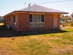  27 Lola Ave Millmerran QLD 4357 $285,000 Residential Bedrooms: 3 Bathrooms: 2 Block Size: 1,012 Hectares 27 Lola Avenue – Near new brick home – 2 bathrooms – $285 000 – Area: 1012 Square metres This neat 3 b/r steel framed home has built-ins in all b/rs, main b/r has ensuite + extra built-in storage, modern kitchen with electric wall oven & bench hotplates, combined with the large open plan dining / living area, formal lounge with r/c air-conditioning, laundry with built-in storage, bathroom with separate shower bath & vanity, separate toilet, front entry, tiled throughout, ideal location, walking distance to school, shop & sporting facilities. 