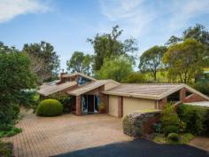  169 Blackrange Road Bega NSW 2550 $650,000 EXECUTIVE LIVING L5567. Just a 5 minute drive from Bega and enjoying fantastic, north facing views, this spacious residence features 4 bedrooms, 2 bathrooms, 2 separate living areas and a well equipped open plan kitchen & dining.  Set on 5 acres, the property has beautiful established gardens as well as ample room for animals, and includes horse shelters and as well as additional shedding.  Sealed road frontage and driveway, supplementary back to grid solar system and both town & tank water are added features of this very attractive property.   Property Snapshot  Property Type: House Land Area: 5 acres 