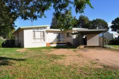  30 Herbert St Gulgong NSW 2852  $225,000 WHAT A BARGAIN This centrally located 2 bedroom brick home has just had a fresh coat of paint and presents very well. The bedrooms are generous in size and the master has a built in robe. The living area is open plan and boasts polished cypress pine timber flooring. The yard is level and fenced at the rear and has the convenience of rear lane access. A fantastic little home or perfect investment property with an estimated rental return of $250pw.   Inspection Times Contact agent for details Features Rear Lane Access Built In Robes Fully Fenced Secure Parking Water Tank Land Size 1022 m2 