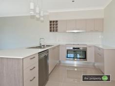  1 Anna Louise Terrace Windaroo QLD 4207 $400,000 - $420,000 Located on the 18th fairway of the Windaroo Lakes Golf Course are these eight brand new luxury Townhomes.  These two storey townhomes are approx 257sqm each, finished with high quality fixtures and fittings. They offer uninterrupted views of the Golf Course. Whether you're a golfer or just like open space with no rear neighbours, each townhome is large and offers the following over two levels: Lower level Spacious entry with double car garage and storage, 3rd toilet/powder room, open plan living onto the alfresco area and courtyard, well appointed kitchens (stone bench tops) with walk in butler's pantry. Upper Level  There are three bedrooms, main bedroom with ensuite, multipurpose/media room, main bathroom plus study. The eight townhomes are set in a quiet neighbourhood and have been designed to complement the convenient location between Brisbane and the Gold Coast. Whatever your situation, these should be on your inspection list. Features Outdoor entertainment areaCourtyardUndercover outdoor areaSmoke AlarmsSafety SwitchOvenHot plateRange hoodDishwasher Property Details Bedrooms 		 3 Bathrooms 		 1 Ensuites 		 1 Garages 		 2 