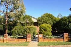 178 Mayne St Gulgong NSW 2852 $375,000 HIDING BEHIND THE TREES This quintessential family home offers an array of spectacular spaces both inside and out. The double brick rendered home is made up of 3 large bedrooms all with built in robes and ceiling fans the master also with air conditioning. The light filled country kitchen has plenty of cupboard space and offers both dine in and alfresco dining through the French doors on to the private leafy patio. The spacious living room has a real feeling of warmth and is a central hub of this family home, a formal living room or games / kids living room is adjoining.  Linked to the main house via a sun room is a neat and tidy fully self contained one bedroom granny flat with air conditioning and its own separate power meter. Boasting a 1721m2 fully fenced corner block and backing on to the Gulgong golf course gives you a real feeling of space and privacy as you only have one neighbouring property. Possible subdivision opportunity also exist subject to council approval. The established Australian native garden surrounds the home to create your own private sanctuary with multiple outdoor entertaining areas. The car is not forgotten here with a double garage and workshop plus two carports. All in all a very well presented property with lots to offer.   Inspection Times Contact agent for details Features Entertaining Area Established Gardens Rear Lane Access Built In Robes Floorboards Fully Fenced Open Fireplace Outdoor Entertaining Rumpus Room Secure Parking Shed Water Tank Workshop Land Size 1721 m2 