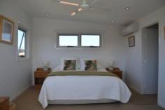  3/89 Kingscliff Street Kingscliff NSW 2487 $720,000 Stunning spacious quality home Townhouse - Property ID: 785576 Situated 100m from the beautiful Dreamtime beach is this gorgeous, modern, air-conditioned townhouse.  Backing onto the lane way, you get the benefit of a quiet position, while still being so close to the beach and all Kingscliff has to offer. This home was designed by a Brisbane architect with the brief to make the most of space and light but also to evoke the mid century beach houses of the Gold Coast and Northern New South Wales beach strip. It has a relaxed retro feel, with the main living area flowing to the outdoor area.  The two floors above provide excellent separation for guests.  On the first upper level is a lounge-tv room, balcony and two double bedrooms and main bathroom. The top floor is the master suite with walk-in robe and ensuite.  The ground level has lounge, kitchen, laundry and powder room.  The lower level has a double lock up garage and a large storage and workshop area. Call Brent Jones on 0408664758 to arrange your inspection of this quality property now.   Print Brochure Email Alerts Features  Air Conditioning  BBQ Area  Dishwasher  Eat-in-Kitchen  Ensuite  Family  Lounge  Workshop  2nd livi 