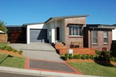  9 Koraaga Rd Gerringong NSW 2534 FOR SALE $575,000 Property Facts Property ID2843783Property TypeHouse For SalePrice$575,000Land Size-House Size-Council Rates-Water Rates-Strata Levy-Tender Date N/A Inspection Times Saturday, 11 April 201511:30AM - 12:00PM        Impeccable Town House FOR SALE $575,000 Image GalleryPrint A BrochureEmail A FriendBookmark Property More Sharing Services Located just metres from farmland and only a short walk to Gerringong public school is this immaculately presented 3 bedroom dual occupancy town house. All rooms are double size with the main bedroom having an ensuite and there is plenty of winter sun in the north facing living room which also enjoys views over the escarpment. The kitchen really is a good size which looks out to the covered outdoor entertaining/ sitting area which has a fenced lawn for littlies or small pets. There's room for a car plus storage in the big garage and also a car port for more off street parking and other bonuses include plantation shutters, ceiling fans in all rooms, gas heating and security screen mesh door. This really is a quiet part of town where you can sit on the hardwood front deck and watch the cows grazing out in the paddocks and its only minutes away from both 7 mile and Werri beach, what a fantastic place to live!! 