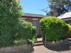  2/75 High Street East Maitland NSW 2323 Offers over $199,000 INVESTORS TAKE NOTE!! Set in a private complex in a prime location close to Lawes Street shops and Victoria Street train station this solid brick unit must be sold.  Offering 2 double bedrooms both with built in robes, large open air conditioned living area leading to a laminate kitchen with electric stove, bathroom with large shower and internal laundry.  Currently rented to a quality long term tenant and returning $280 per week it makes for a very sound investment.  The unit offers a very private courtyard and single carport parking with landscaped gardens.  Book your inspection today!!!   Property Snapshot  Property Type: Unit Construction: Brick Features: Built-In-Robes Close to schools Close to Transport Courtyard Established Gardens Lounge Storage 