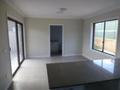  10/17 Marsden Ln Kelso NSW 2795 $380,000 A Special Place to Live 'Magnolia Manors' From the time you walk in the front door of this unit you will notice the generous living areas and you can see that this is not your normal unit, it is something special. There is a mixture of ceiling heights which adds to the spacious feel. The units main bedroom is featured with a generous En-Suite. Both the bedrooms have Built Ins. (The garage has Automatic remote doors).  Being a gated development, security is at its best. Each unit and the entire complex will be fully fenced. Ducted Electric Heating and Cooling is complemented with R2 insulation to the walls and R3.5 to the ceilings. Anyone living here will be comfortable in all the seasons and as economically as possible. The fixtures with this unit are quality. The kitchen has been designed with ease of use and cupboards in the right places. 20 mm Caesar Stone tops (naturally) , Omega 75 cm Stainless Steel Cook top, Oven, Dishwasher & 90 cm Stainless Steel Range-hood. Bathroom and En-Suite has Duraplex-Demeter Vanities with China Tops and Merrica Tap ware. Hot water system is BOSCH Instantaneous for maximum economy and efficiency. Type: Unit Bed: 2    Bath: 2    Car: 1     Building Size: 147.9 sqm (approx) 