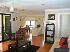  28 Beelong St Macleay Island QLD 4184 $339,000 Water Views, 3 Bedrooms, Beautiful Beelong Street! This quality high-set is a much-loved family home with lovely water views across to Stradbroke Island. Positioned on a big 1,050 m2 block in sought-after Beelong Street, this property is very handy to water access and is loaded with features including: * Spacious open plan living and dining flows to covered outdoor living area * 3 built-in bedrooms, main with walk-in robe and sliding door to front deck * Roomy kitchen with breakfast bar, electric cooking and pantry * Relaxing covered front veranda with good water views to Straddie * Family bathroom features bathtub and separate shower, plus separate toilet * Fully concreted underneath with good height and plenty of potential * Large laundry/store room and an extra toilet downstairs * Big concreted and decked outdoor living areas downstairs * Single garage plus multi vehicle parking potential underneath * Generous 1,050 m2 block, nicely landscaped like the Botanic Gardens * Excellent position on waterfront street near north-eastern tip of Macleay  This quality family home is beautifully presented and features extras like ceiling fans throughout, polished timber floors, security screens, the list goes on. Downstairs has excellent height and is fully concreted, with obvious development potential as a toilet and laundry are already in place. There is plenty of room for a workshop area, boat and trailer, etc., and it would be relatively simple to create self-contained living downstairs for guests or extended family. The back yard is a gardener's delight, with a profusion of plants and shrubs giving a great tropical atmosphere. Beelong Street is a beautiful part of the island, catching the prevailing breezes and with picture postcard views to Stradbroke Island. The sheltered swimming area at Pat's Park is nearby, and excellent boat ramp facilities at Dalpura Beach are also just a couple of minutes away. Access to the waterfront via a block of Council land is less than a minute's walk down Beelong Street. This would be an idyllic place to enjoy our unique island lifestyle, and Macleay Island has so much to offer, with a friendly country town atmosphere, fast reliable ferries and with shops, parks, clubs and essential facilities here on the island and ready for you to enjoy. For more information or to arrange your inspection and free pick-up from the jetty, please contact the listing agent.   Property Snapshot  Property Type: Water Views (some) Construction: Hardiplank Land Area: 1,050 m2 Features: Built-In-Robes Decking Dining Room Fully Fenced Yard Landscaped Gardens Lounge Outdoor Living Polished Timber Floors Security Screens Undercover Entertainment Area Verandah Walk-In-Robes Waterview 